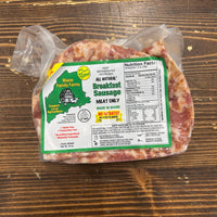 Packaged meat product with a label on a wooden surface